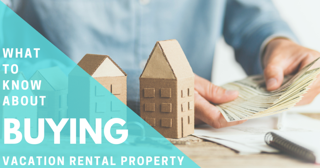 Man holding cash beside model buildings, illustrating “What to Know About Buying Vacation Rental Property.”