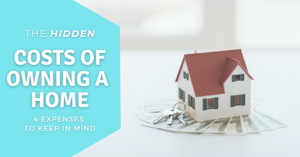 Small model house sits on pile of bills with keys beside it on a white table, illustrating blog post “The Hidden Costs of Owning a Home: 4 Expenses to Keep In Mind”